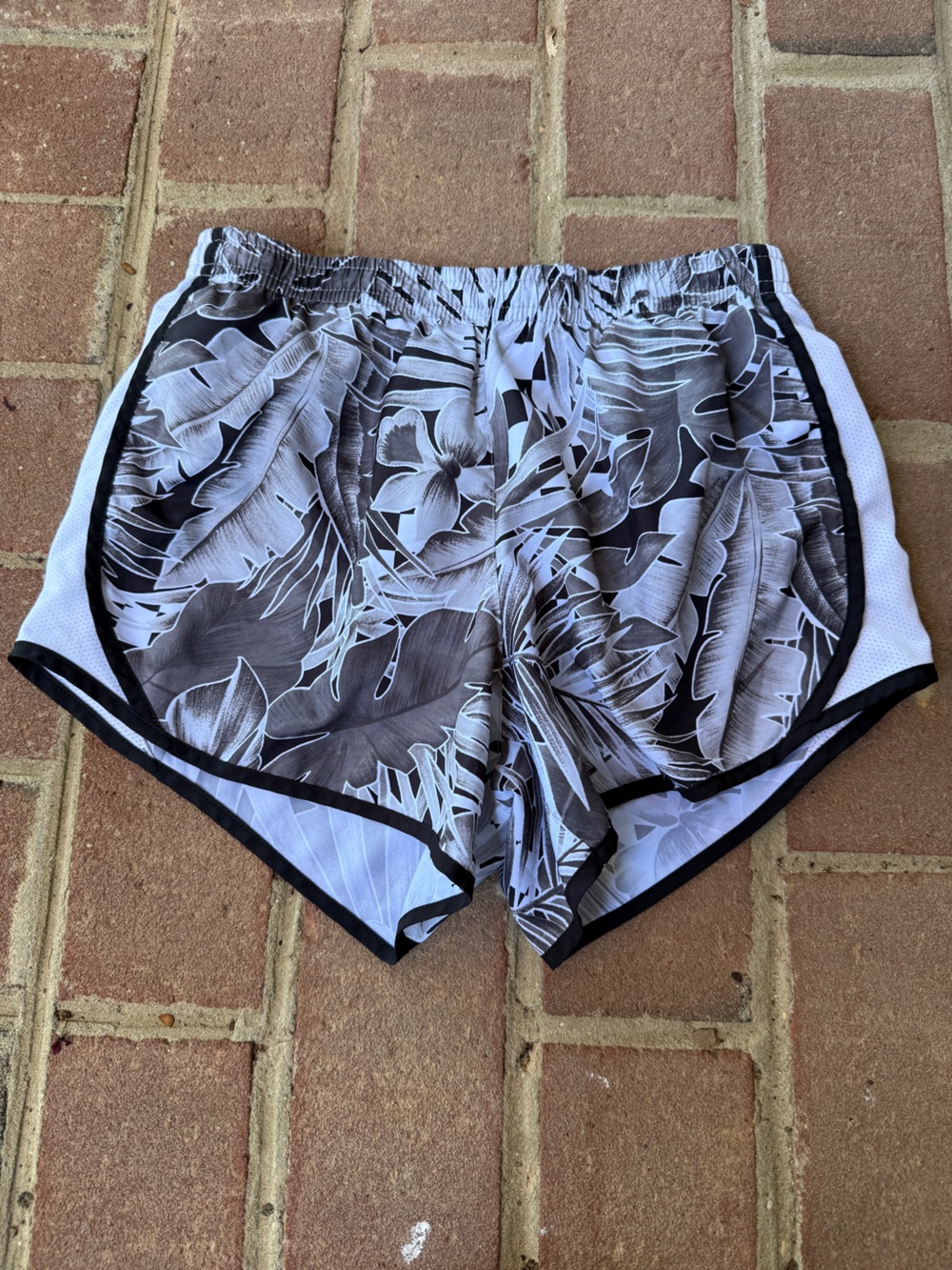 Nike White Athletic Shorts with Black Tropical Print Trim Youth L